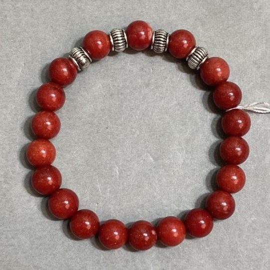 Bracelet Coral smooth round bead 8 mm +-, length 18 cm +- stretch