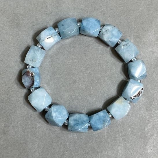 Aquamarine bracelet faceted, diameter 12x10–11mm+- bead 3mm+-, length 18cm +- stretch