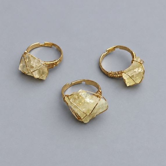 Ring, Citrine natural stone sizes 14-17x9-13mm+- (assorted sizes) in wire wrapping