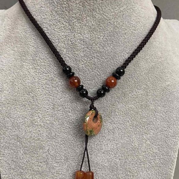 Pendant "Bagel" Heliotrope, diameter 18mm+- Carnelian cylinder 11x6mm+- on a cord, length 64cm+