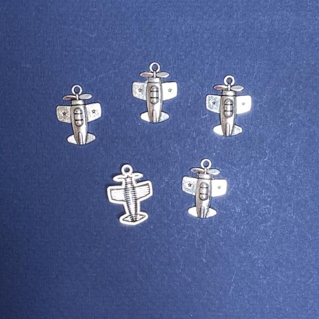 Findings Pendant Little Plane 15x20mm pack 20g +/-15pcs