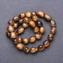 Tiger's Eye Natural Stone Tumbled Beads on a Strand, diameter 9-12x8mm +/-, length 38cm
