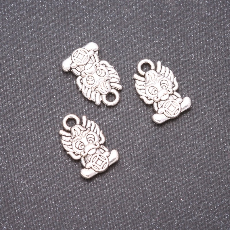 Finding Pendant Dragon, diameter 15x10mm, hole diameter mm, pack 20g +/- 22pcs