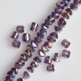 Crystal beads in "Swarovski" style, lilac with gold "petrol" coating, diameter 2.5x4mm strand, length 48cm