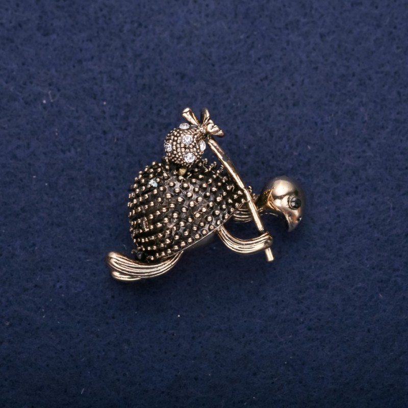 Brooch Turtle with knot, white rhinestones, yellow metal, 30x30mm