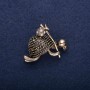 Brooch Turtle with knot, white rhinestones, yellow metal, 30x30mm