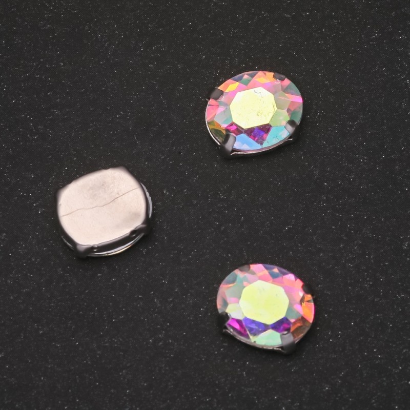 Price per pack /10 pcs. Sew-on crystal in claw setting Oval 8x10mm iridescent