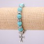 Turquoise Bracelet on Elastic Band, Diameter 10(+-)mm, Length 18cm with Inserts and Cross Charm