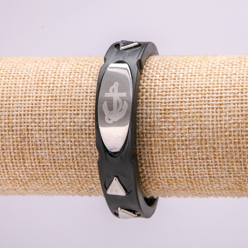 Bracelet with metal inserts, 21cm length, 15mm thickness, black rubber, with clasp
