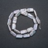 Natural Baroque Pearl Strand, diameter 18x10mm, length 39cm + - with petrol sheen