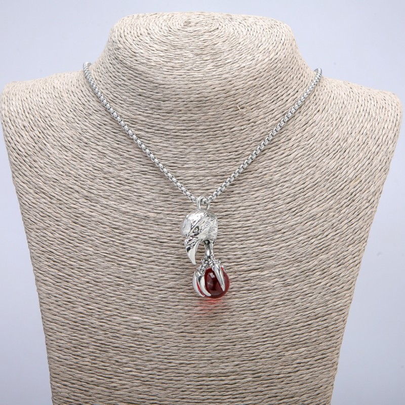 Pendant "Bird with Orb" 47x18mm on a chain, 70cm length, silver-tone metal