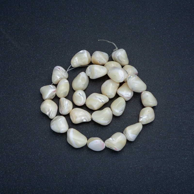 Beads on a string natural mother-of-pearl tumbled, diameter 16-19x12-14mm, length 38cm+