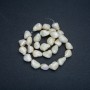 Beads on a string natural mother-of-pearl tumbled, diameter 16-19x12-14mm, length 38cm+