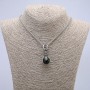 Pendant "Paw with Ball" 45x20mm on a chain, length 70cm +/- silver-tone metal