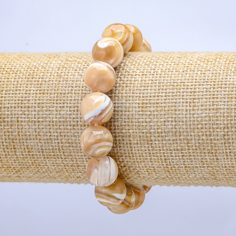 Elastic bracelet with natural mother-of-pearl, beige, smooth beads, diameter 10mm±, length 18cm±