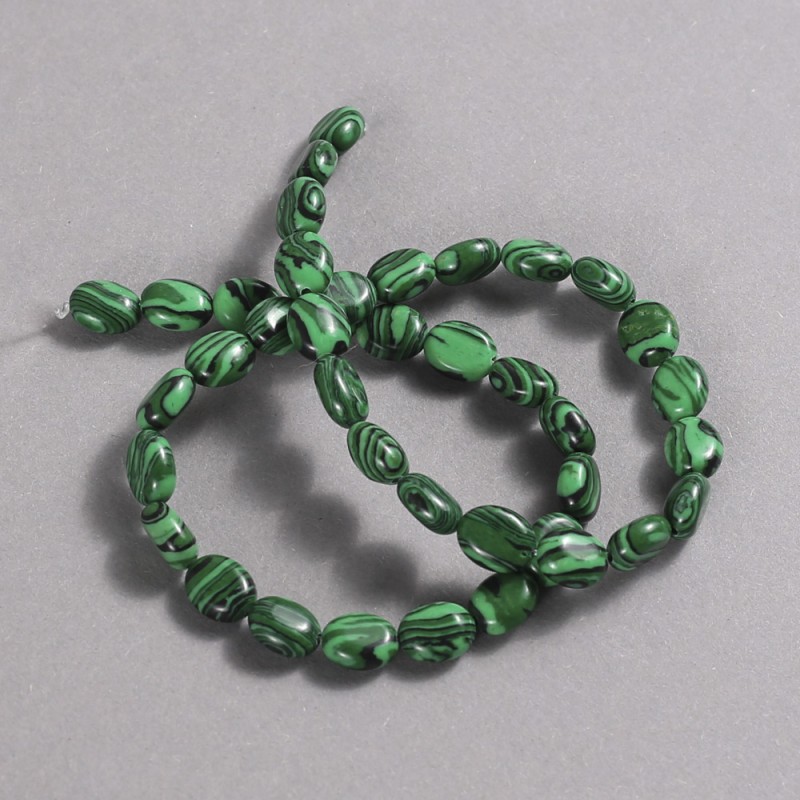 Beads on a Strand Malachite (Pressed) Smooth Oval, diameter 10x8mm+/-, length 39cm+