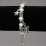 Bracelet on Elastic Band with River Pearls, Silver-Tone Inserts and Charms, diameter 8-10mm+/-, length 18cm+
