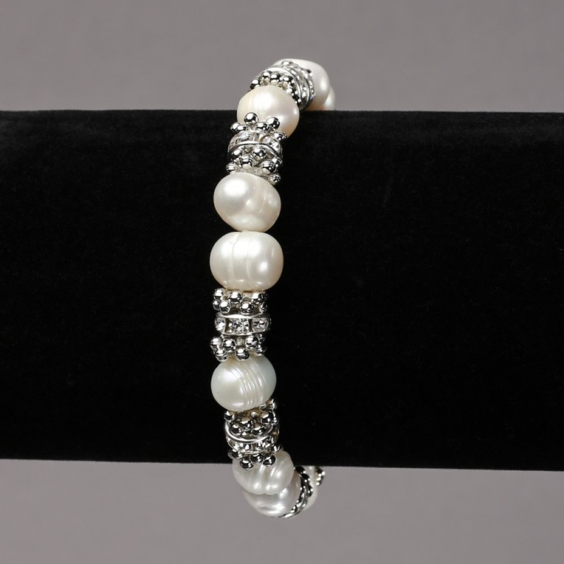 Bracelet on an elastic band with freshwater pearls with silvery inserts and rhinestones, diameter 8mm +/-, length 18cm +/-