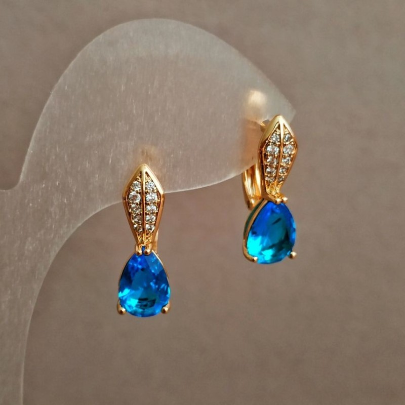 Xuping Earrings, 18K Gold Plated with White Rhinestones and a Sky-Blue Crystal, 20x6mm +