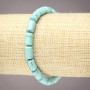 Bracelet on elastic with Turquoise (artificial) smooth cylinder beads, diameter 10x6mm+