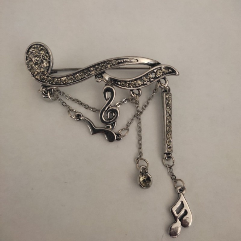CLEARANCE Brooch 'Note with Charms' in dark gray metal and crystals 19x50 mm +