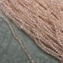 Czech Crystal Beads on Lasting Thread, pale pink transparent with gasoline faceted rondelle, diameter 3×2.5 mm + -, length 36 cm +