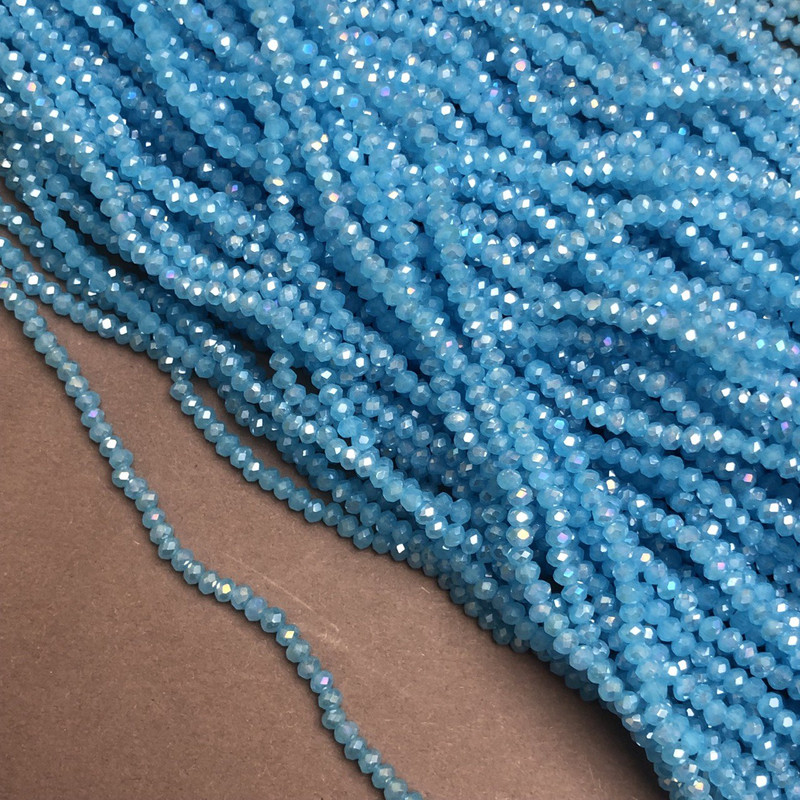 Beads Czech Crystal on fishing line blue with oil-slick iridescence faceted rondelle, diameter 3×2.5 mm ±, length 36–38 cm +