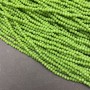 Czech Crystal Glass Beads on Stretch Line Lime Matte Rondelle, diameter 3×2.5 mm + -, length 36-38 cm +