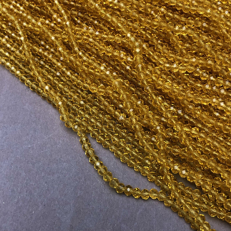 Beads Czech Crystal light yellow faceted rondelle on fishing line, diameter 3.5×3 mm + -, length 36-38 cm +