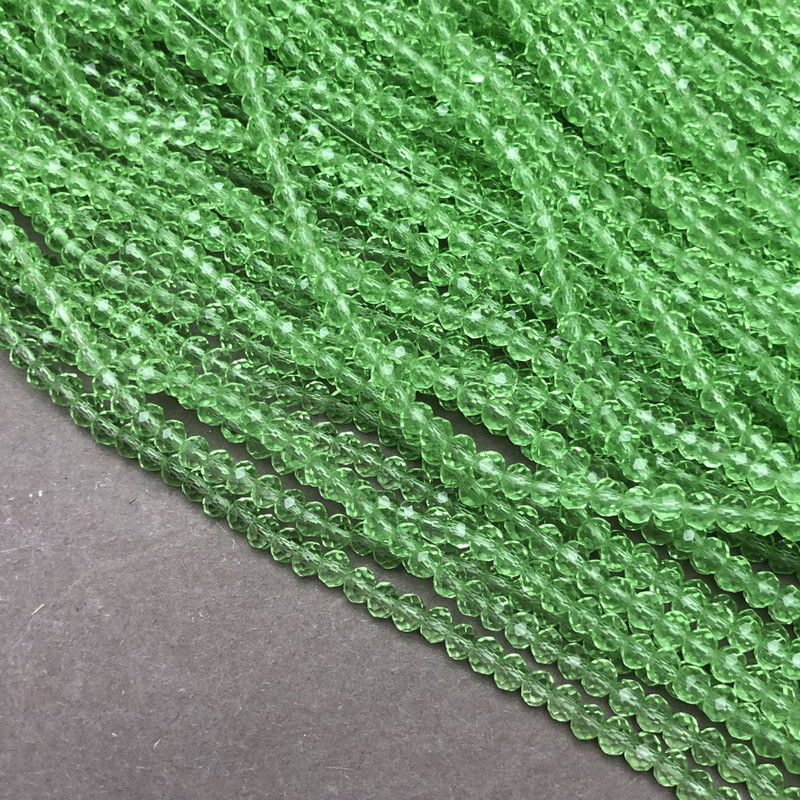 Beads Czech Crystal on thread salad green transparent faceted rondelle, diameter 3.5x3mm + -, length 36-38cm +