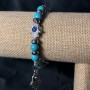 Turquoise Bracelet (individual) on elastic, 8mm± diameter with silver-toned inlays, palm-shaped elements and pendants, length 18cm+