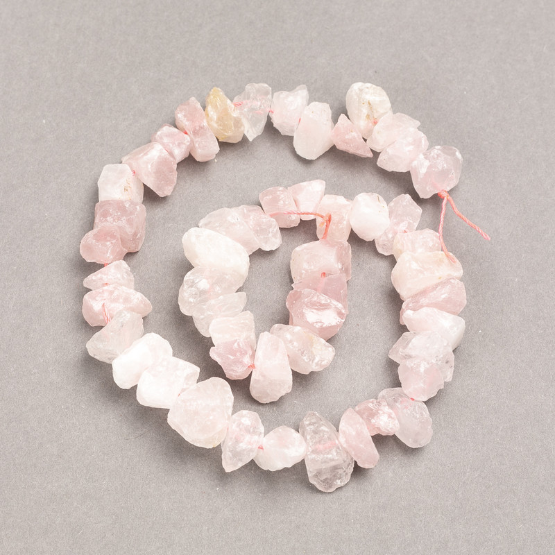 Unpolished Pink Quartz Nuggets on Thread, faceted, diameter 13x8 mm (+-), thread length 41 cm