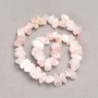 Unpolished Pink Quartz Nuggets on Thread, faceted, diameter 13x8 mm (+-), thread length 41 cm