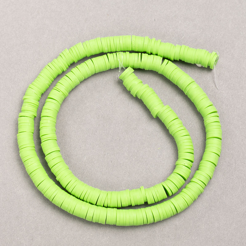 Flat round beads made of polymer clay, salad green color, diameter 6x1mm + -, length 40cm +
