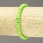 Elastic bracelet with round flat beads made of polymer clay, lime green, diameter 6x1mm, length 18cm