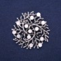 Brooch pendant "Little Branches" White Cat's Eye, silvered metal 60mm