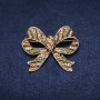 Brooch Accent Bow 55x45mm rhinestones color green yellow gold-toned metal