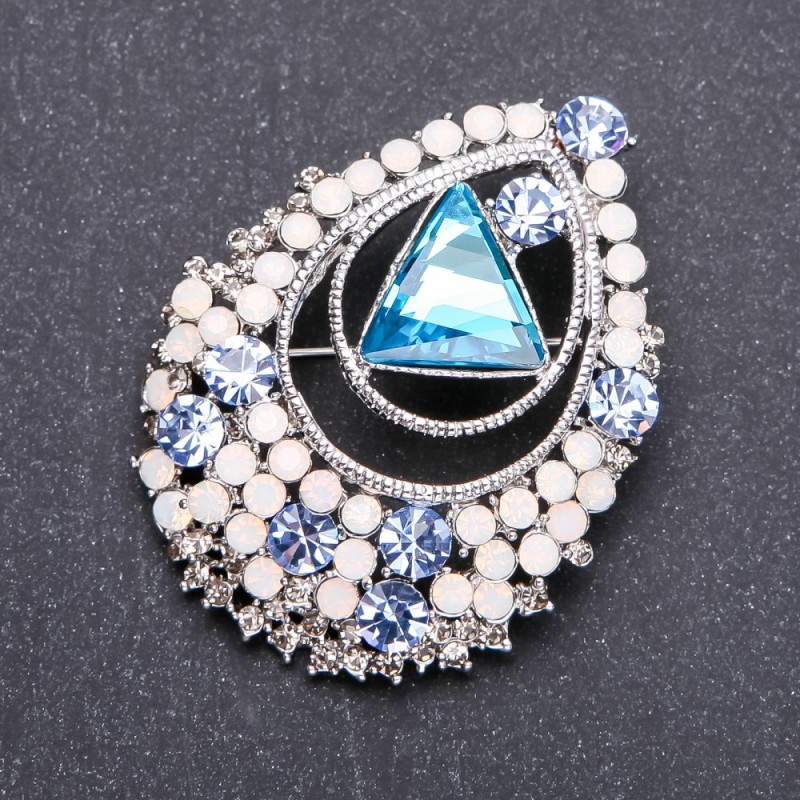 Brooch with light blue crystal 44×56mm white metal