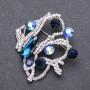 Brooch with Blue Crystals in White Rhinestones 56x53mm White Metal