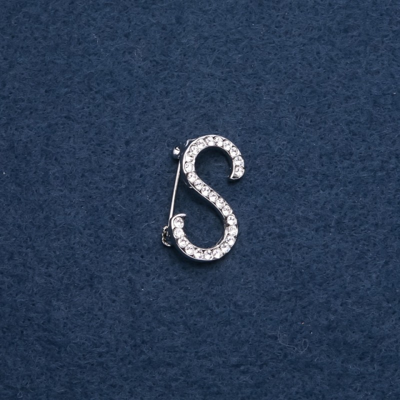 Brooch with initial letter "S" 28x17mm metal color "silver"