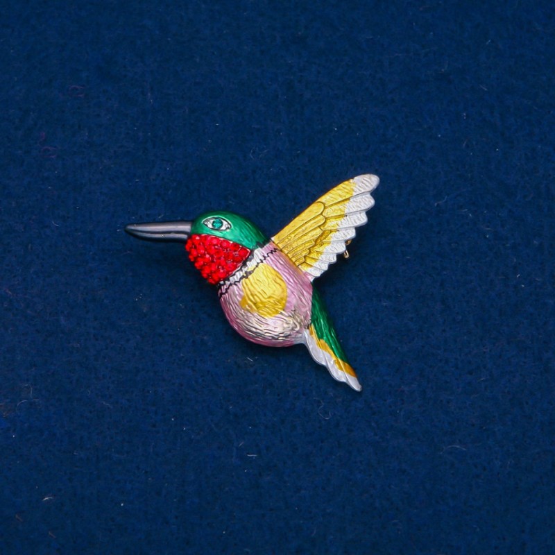 Brooch 'Bird' with enamel and green and red rhinestones, golden metal 37x44mm +
