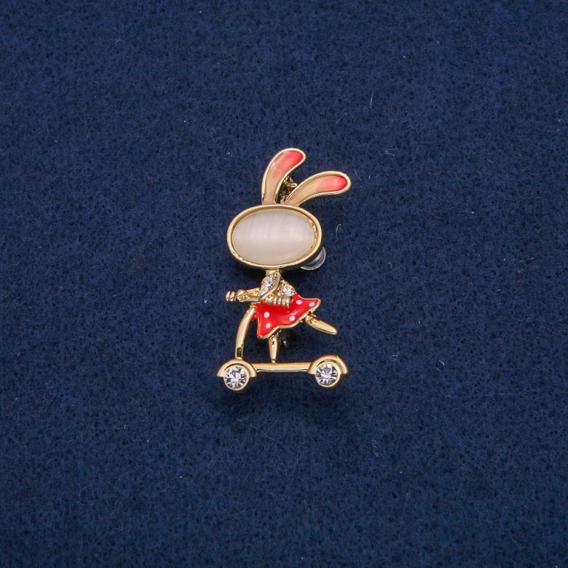 Brooch 'Bunny on a Scooter' with White Crystals, Gold-Toned Metal, Red Enamel, Cabochon Cat's Eye (breeze) 43x21mm +