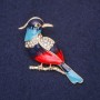 Brooch Bird Ibis with rhinestones blue light blue red white 45x25mm golden metal