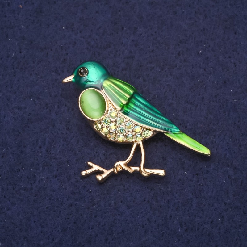 Brooch Bird with Cat's Eye Stone, Green Chameleon Enamel, Zircons, Golden Metal, 44×27 mm