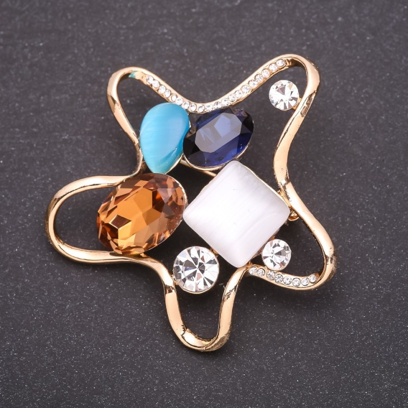 Brooch "Sea Star" with multicolored crystals 55×55mm yellow metal