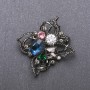 Brooch 'Order of Beauty' with Blue Crystal 51x48mm on Black Metal