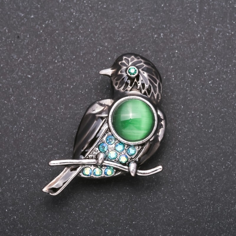 Brooch Bird with blue crystals "chameleon" color of metal "gray" 40x25mm