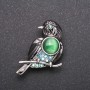 Brooch Bird with blue crystals "chameleon" color of metal "gray" 40x25mm