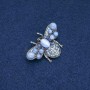 Brooch Butterfly, Cat's Eye, blue crystals, silver metal 40x20mm +