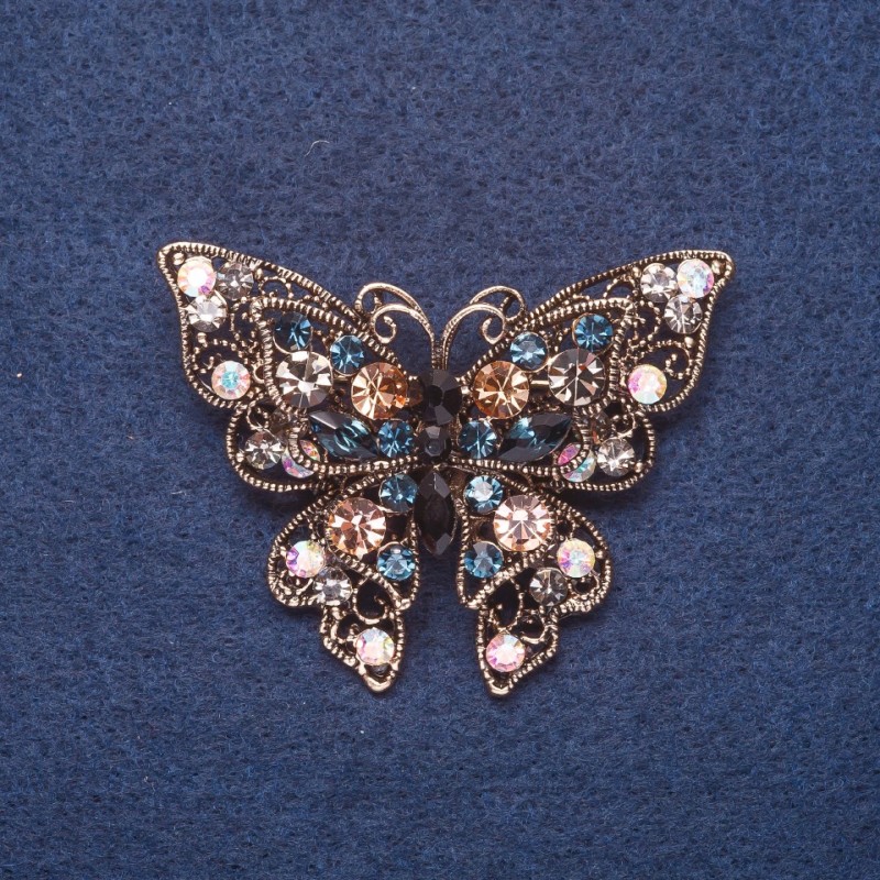 Brooch "Butterfly" in multicolored large rhinestones, metal color gold 4x5, 5 cm